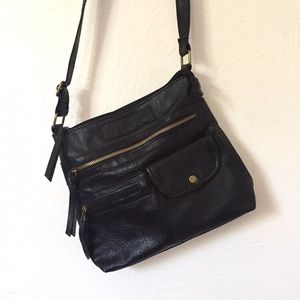 Black faux leather purse with zippers